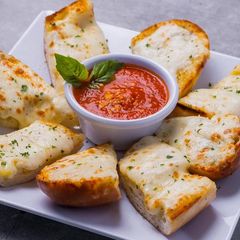Cheesy garlic bread with marinara at Sami's on Marco Island