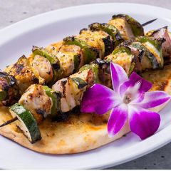 Grilled chicken kebabs on naan at Sami's on Marco Island